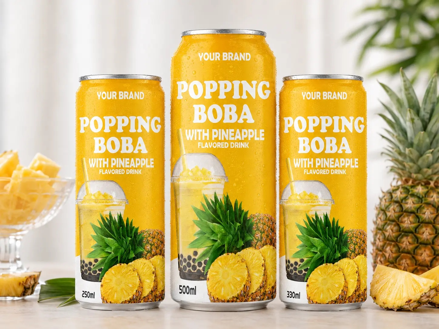 BUBBLE TEA Pineapple flavored popping boba drink shown in 250ml, 500ml, and 330ml cans.